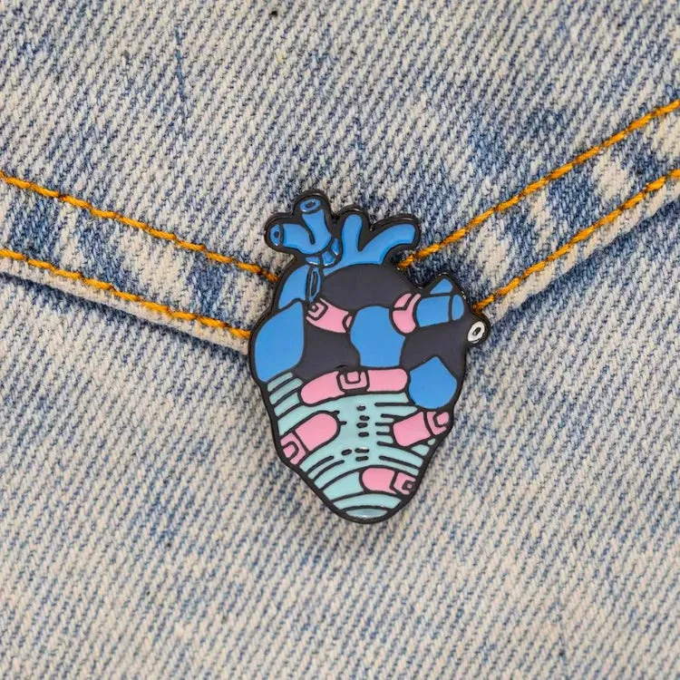 Heart with plasters enamel pin
